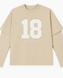 Beige long-sleeve shirt with number 18 and 'WILLYAN GILES' text on a white background