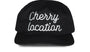 CHERRY LOCATION BLACK CAP