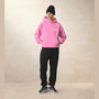 Model wearing pink summit hoodie