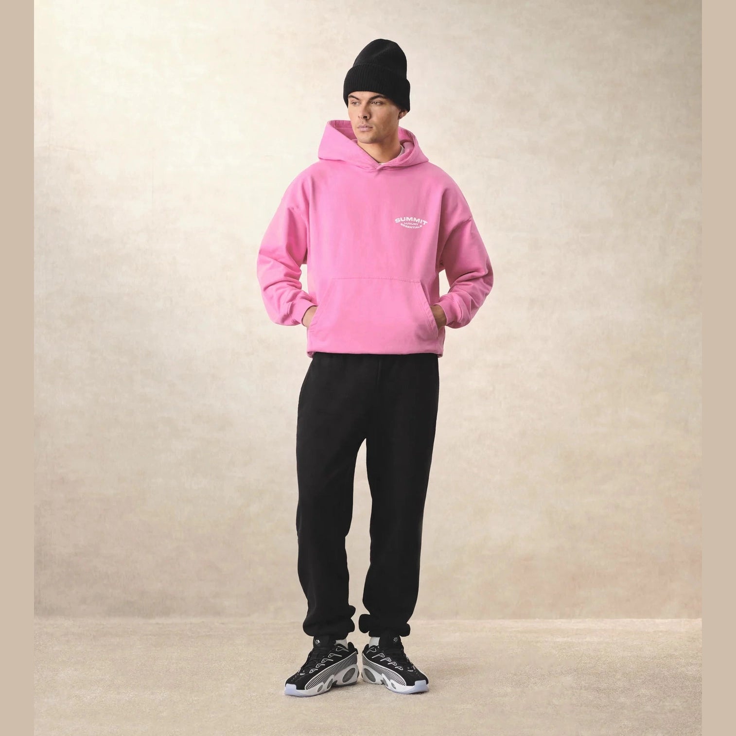 Model wearing pink summit hoodie